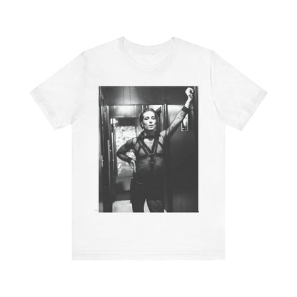 A black graphic t-shirt featuring a graphic of Maneskin emphasizing a rebel rock spirit.