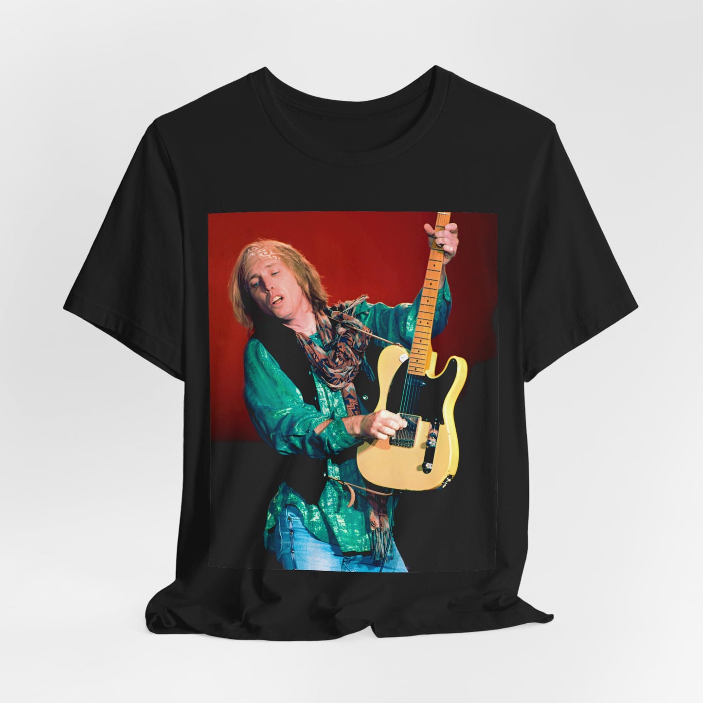 A black graphic t-shirt featuring a graphic related to Tom Petty's 'Free Fallin'' song or era concert.