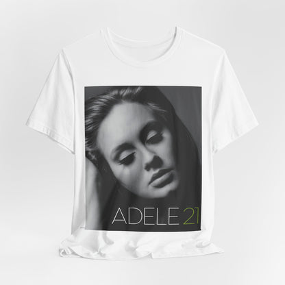 A black graphic t-shirt featuring the album cover art for Adele's '21' album, showing a close-up portrait of her with a contemplative expression.