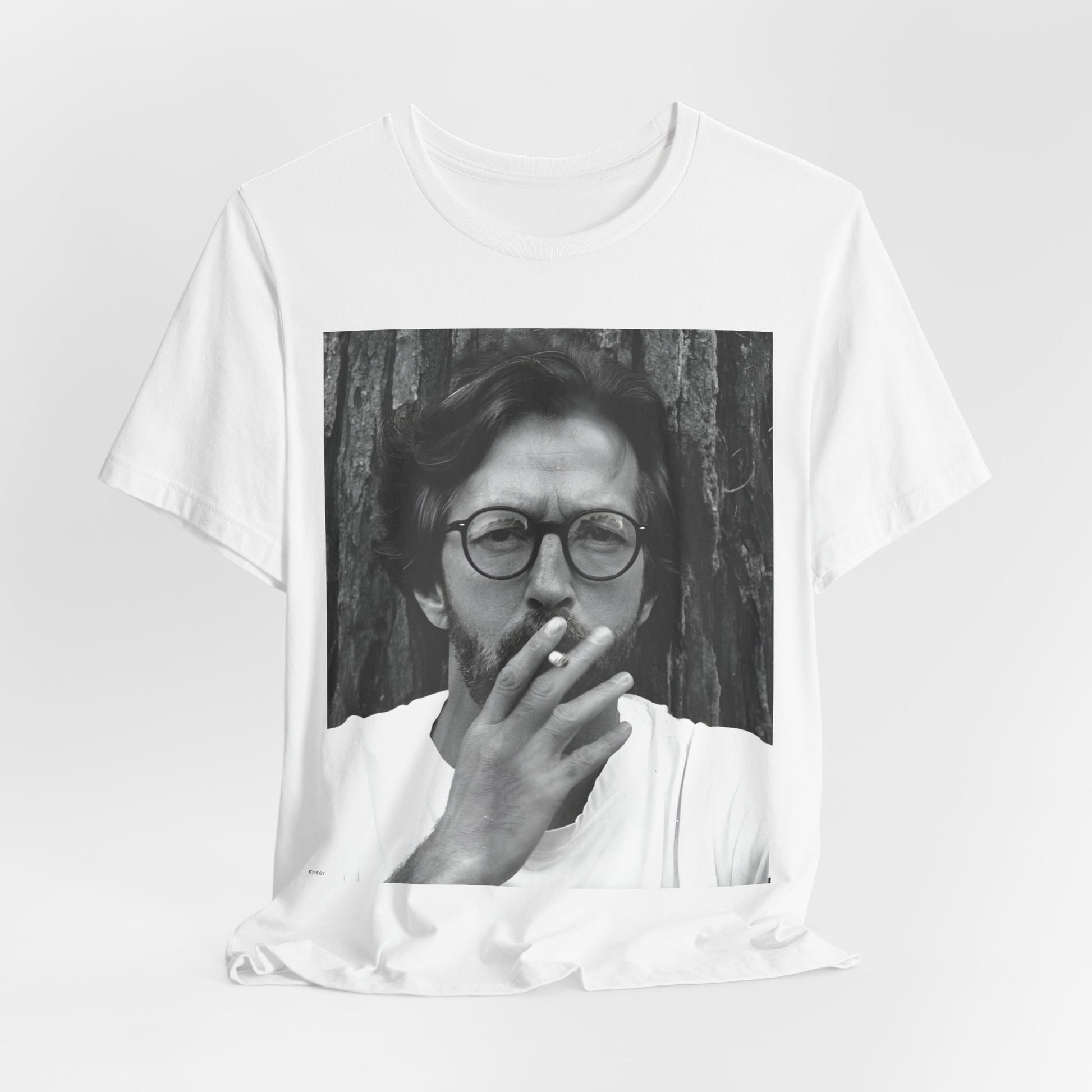 A black graphic t-shirt featuring a graphic related to Eric Clapton's classic Cream era.