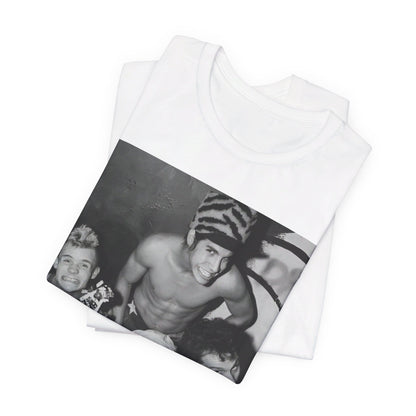 A black graphic t-shirt featuring an 80s vintage funk rock graphic of Red Hot Chili Peppers.