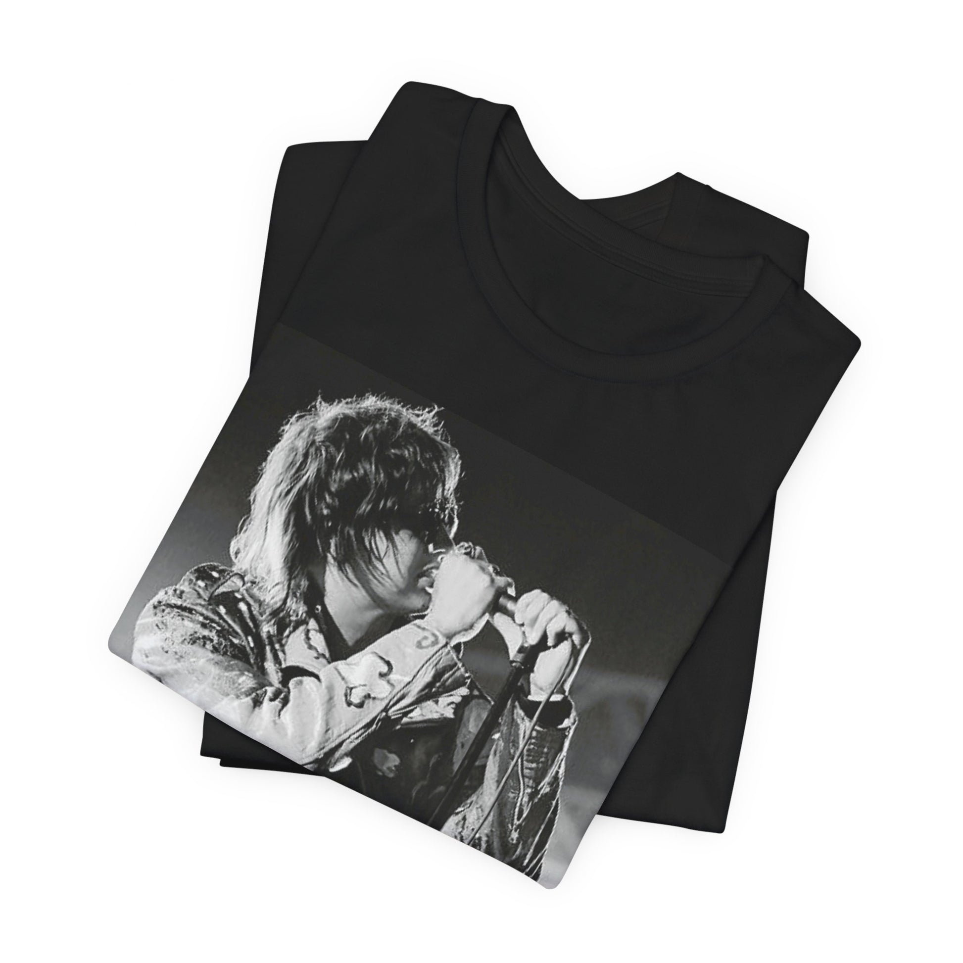 A black graphic t-shirt featuring a vintage graphic related to The Strokes' 'Last Nite' song or era.