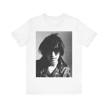 A black graphic t-shirt featuring a graphic related to The Strokes' 'Reptilia' song or era.