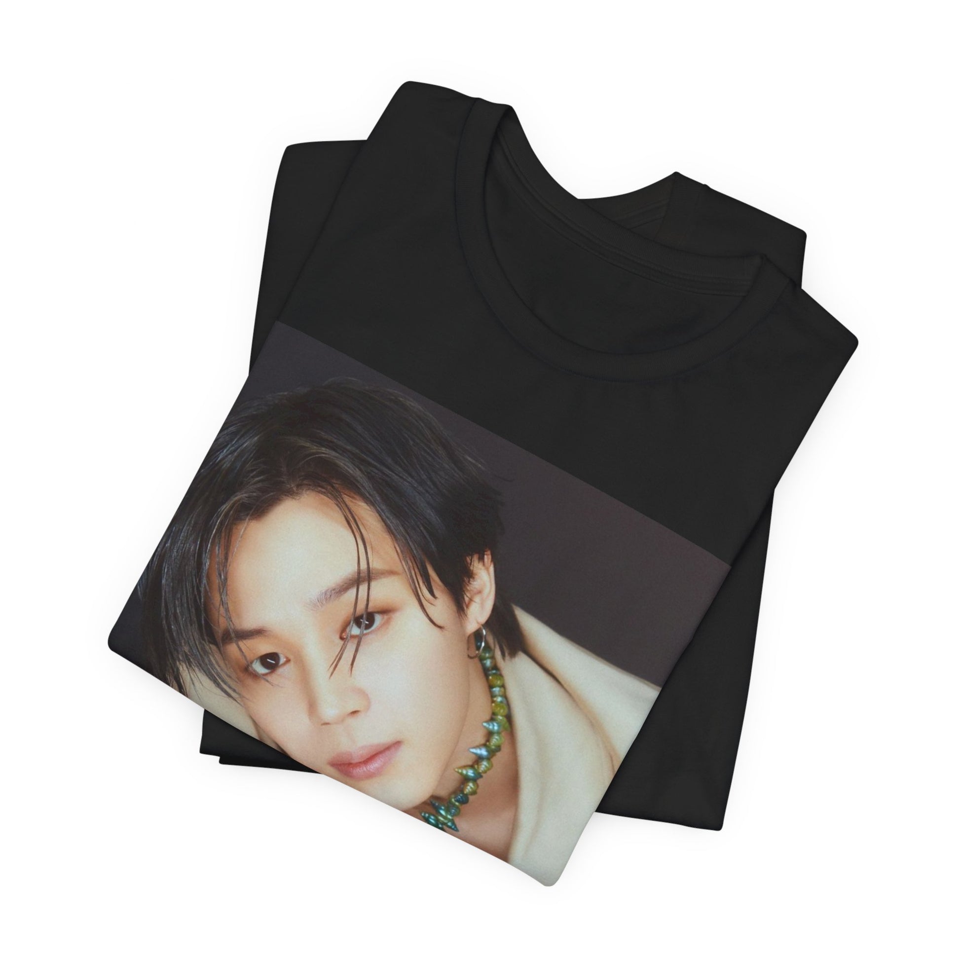 A black graphic t-shirt featuring a retro graphic related to Jimin's 'Filter' era.
