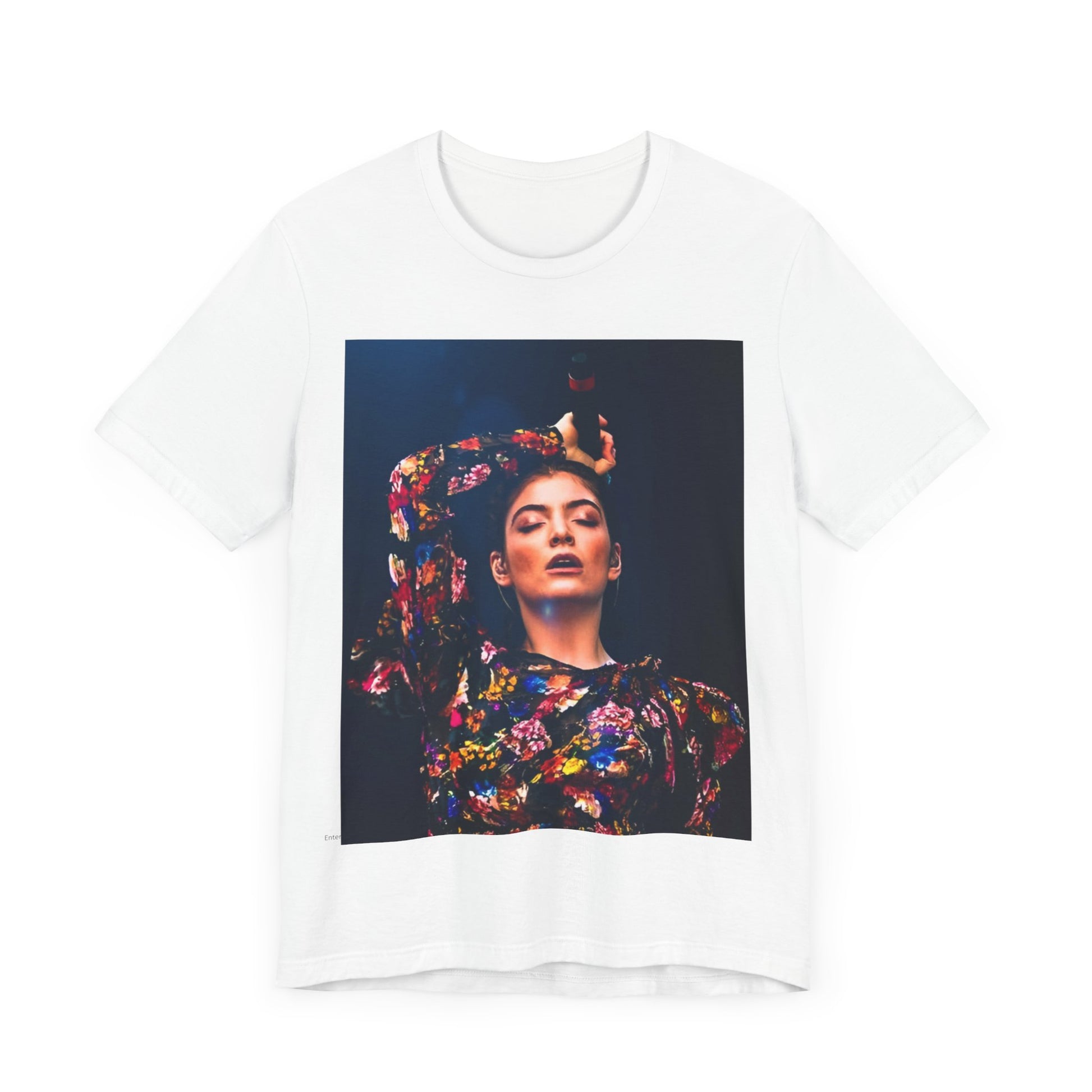 A black graphic t-shirt featuring a retro graphic related to Lorde's 'Pure Heroine' album era.