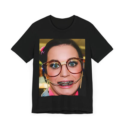 A black graphic t-shirt featuring a graphic related to Katy Perry's "I Kissed A Girl" song or era.