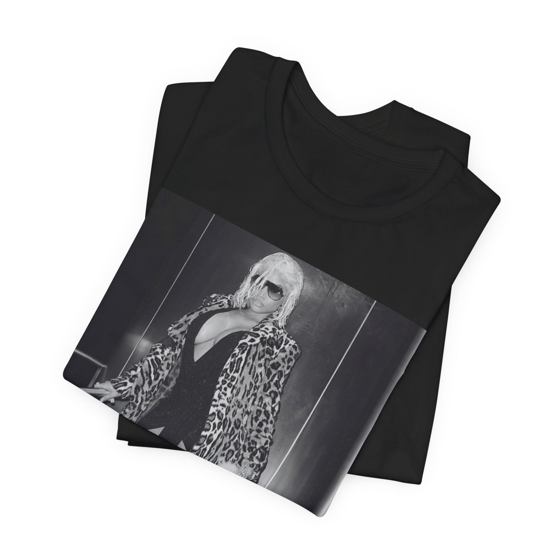A black graphic t-shirt featuring a black and white glam aesthetic graphic of Nicki Minaj.