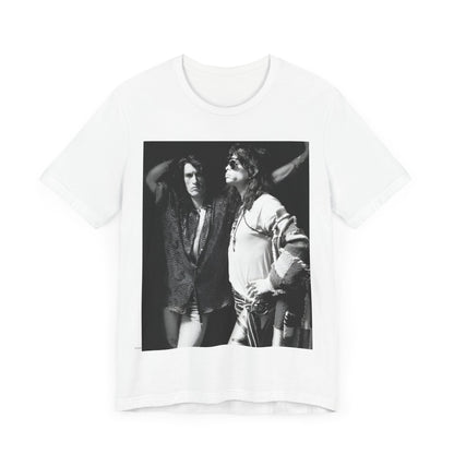 A black graphic t-shirt featuring a dynamic photo or illustration of Aerosmith's Steven Tyler and Joe Perry performing together on stage, highlighting their synergy.