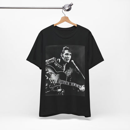 A black graphic t-shirt featuring a graphic related to Elvis Presley's 'Burning Love' song or era.