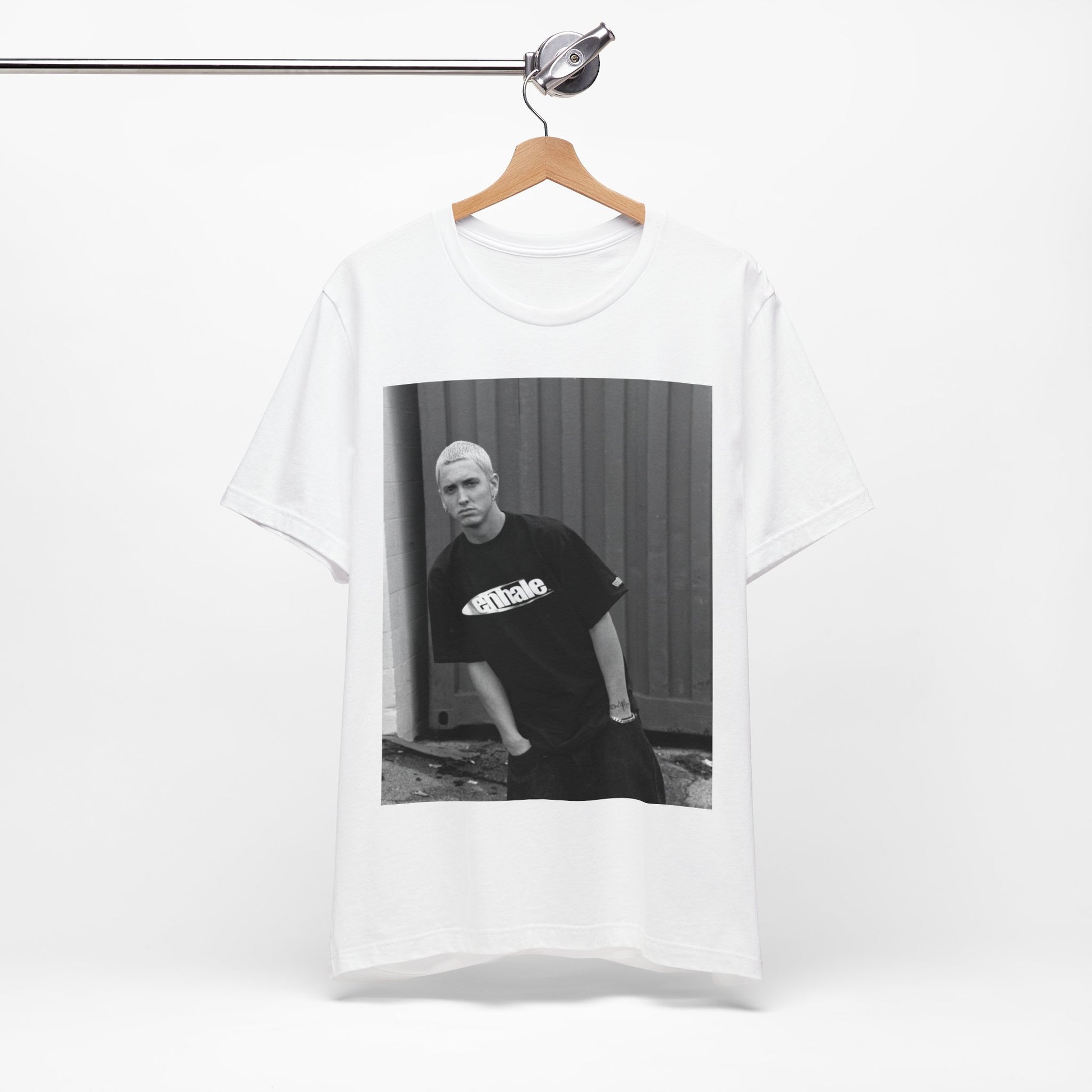 A black graphic t-shirt featuring a graphic of Eminem with a Detroit hip hop aesthetic.