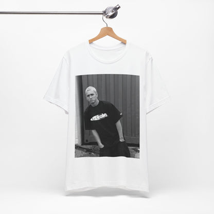 A black graphic t-shirt featuring a graphic of Eminem with a Detroit hip hop aesthetic.