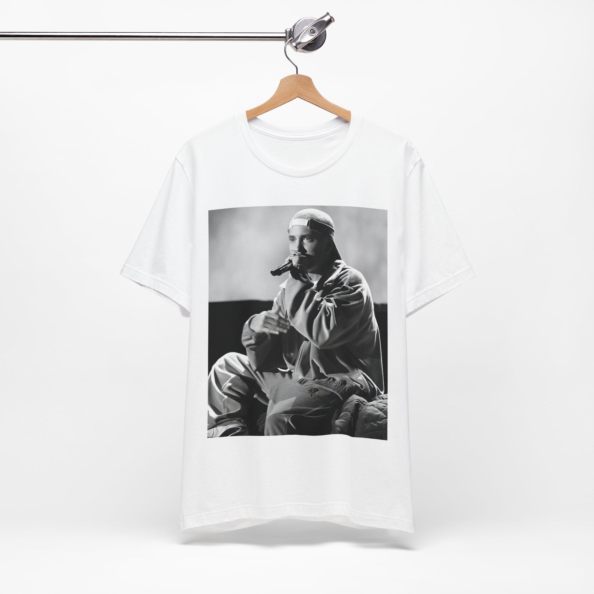 A black graphic t-shirt featuring a black and white graphic of Eminem as a 'Rap Messiah'.