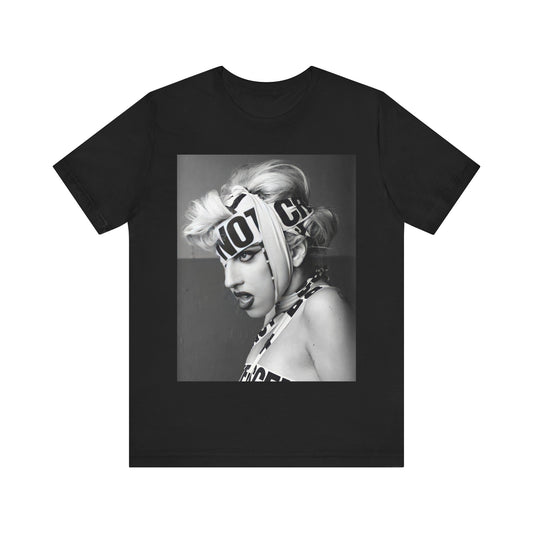 A black graphic t-shirt featuring a glam graphic related to Lady Gaga's 'Born This Way' album era.