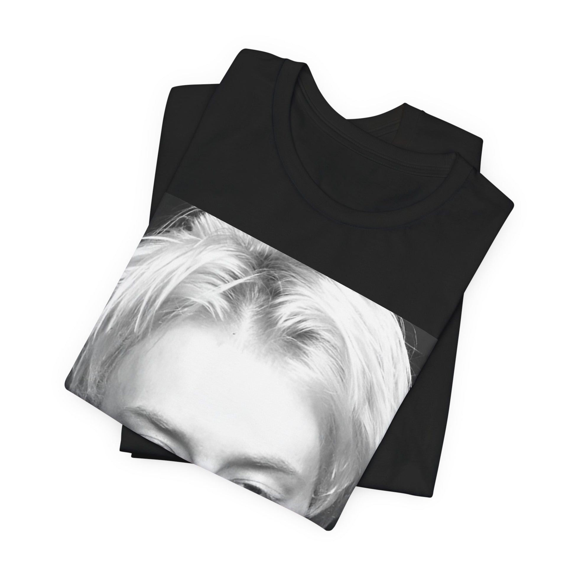 A black graphic t-shirt featuring a 90s black and white portrait photo of Thom Yorke from Radiohead.