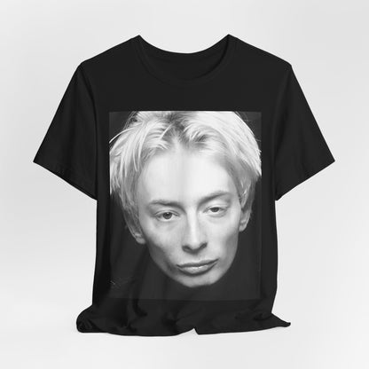 A black graphic t-shirt featuring a 90s black and white portrait photo of Thom Yorke from Radiohead.
