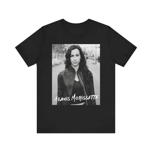 A black graphic t-shirt featuring a black and white photo of Alanis Morissette from 1998, showing her with a poised or thoughtful expression.