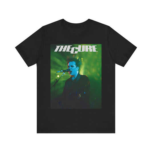 A black graphic t-shirt featuring a graphic or photo of The Cure performing live on stage.