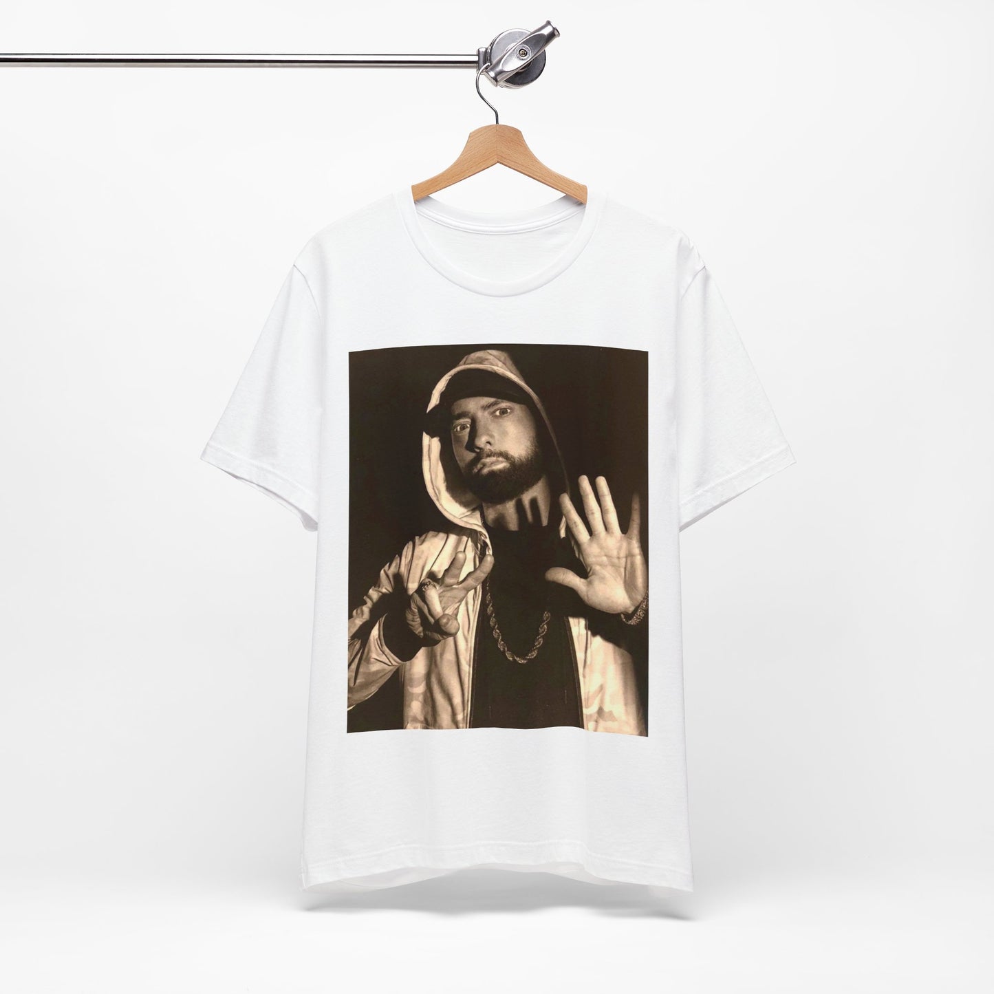 A black graphic t-shirt featuring a graphic of Eminem as an authentic underground rap icon.