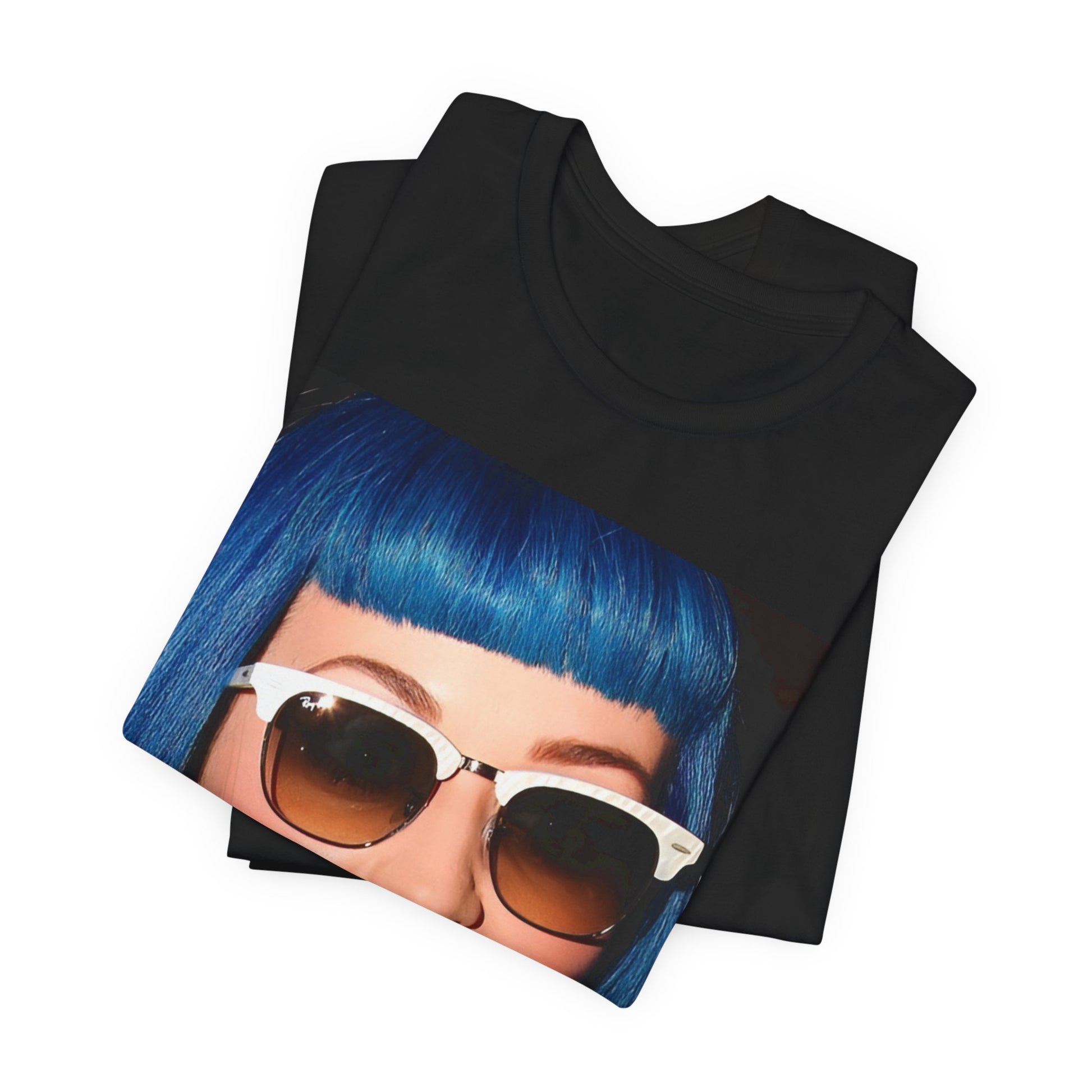 A black graphic t-shirt featuring a retro graphic of Katy Perry with blue hair.