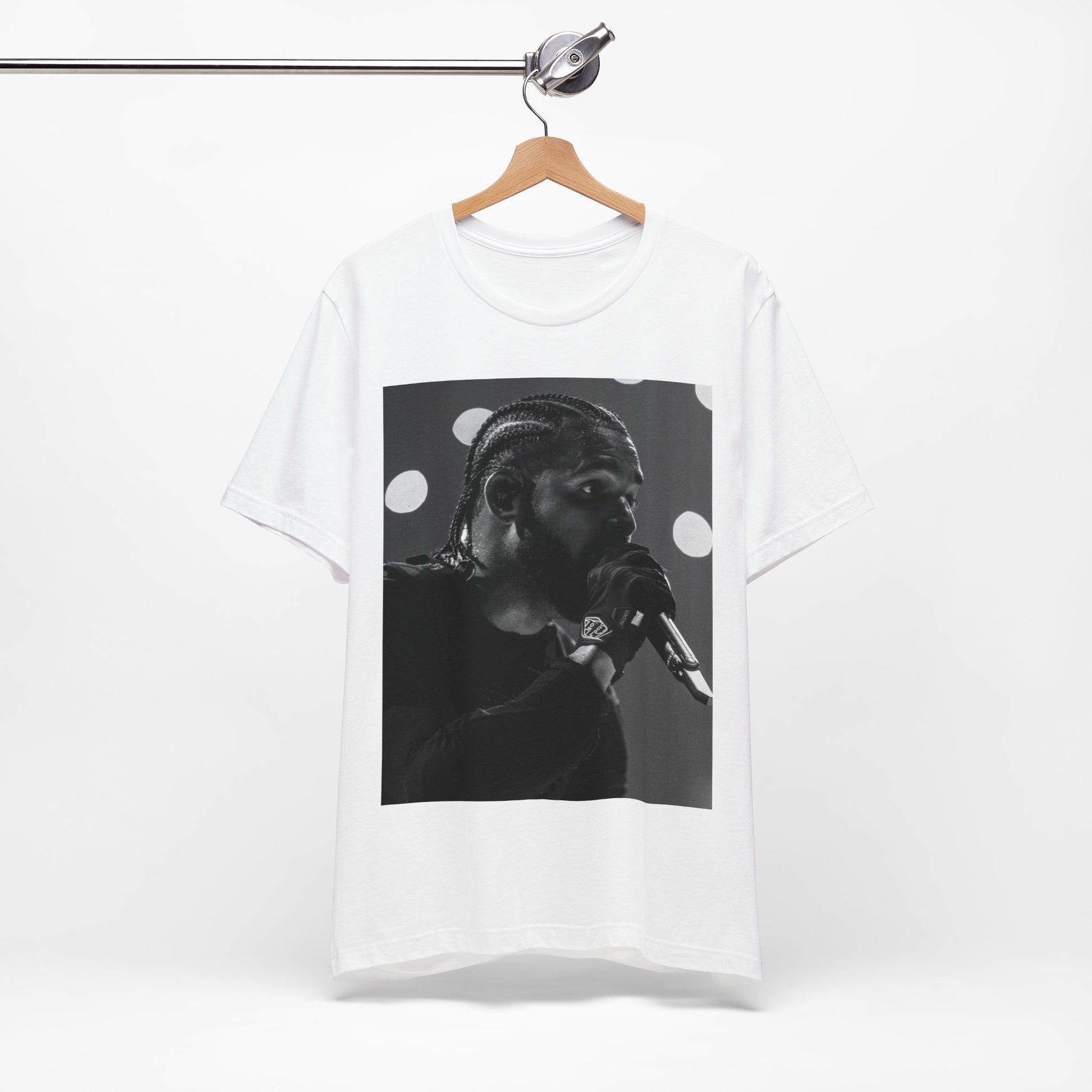 A black graphic t-shirt featuring a classic black and white style graphic of Drake.