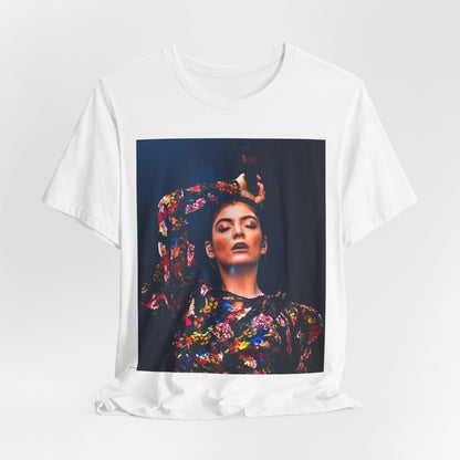 A black graphic t-shirt featuring a retro graphic related to Lorde's 'Pure Heroine' album era.
