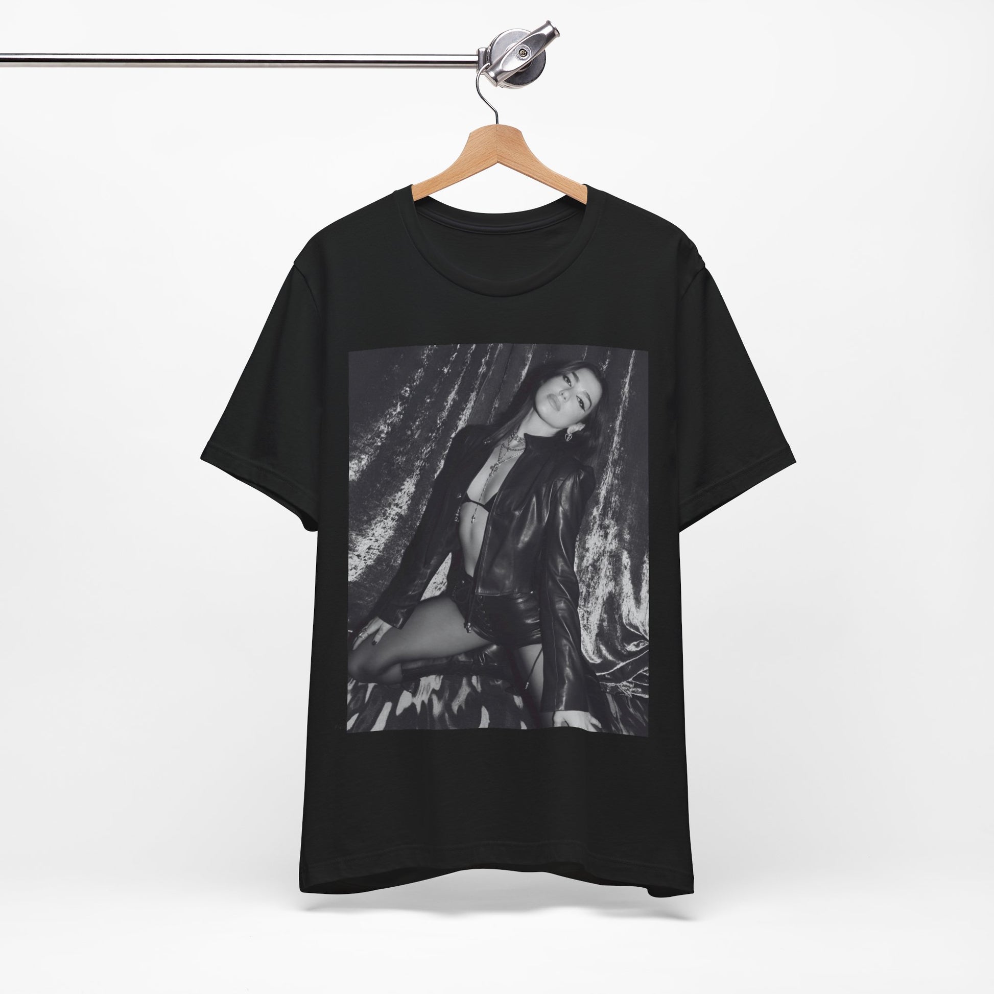 A black graphic t-shirt featuring a black and white portrait photo of Dua Lipa.