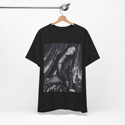 A black graphic t-shirt featuring a black and white portrait photo of Dua Lipa.
