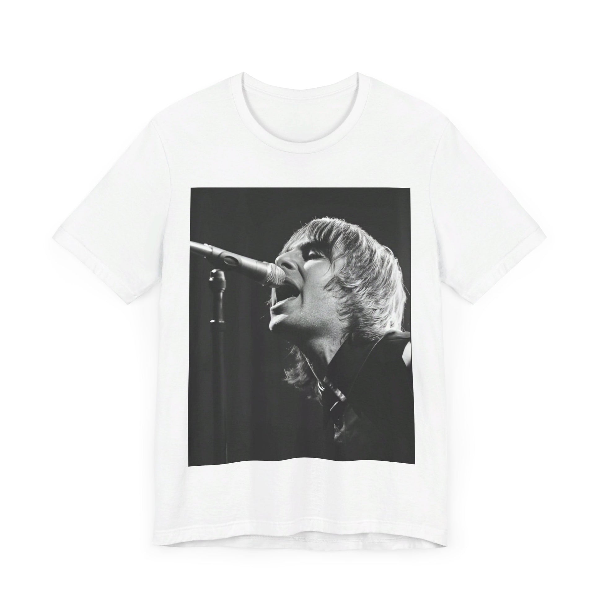 A black graphic t-shirt featuring a black and white graphic or photo of Liam Gallagher from Oasis performing live on stage.