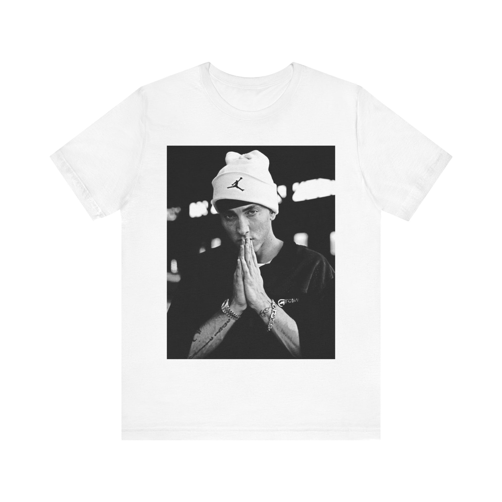 A black graphic t-shirt featuring a black and white portrait photo of Eminem.