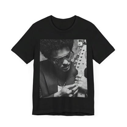 A black graphic t-shirt featuring a graphic of Bruno Mars in a classic crooner style.