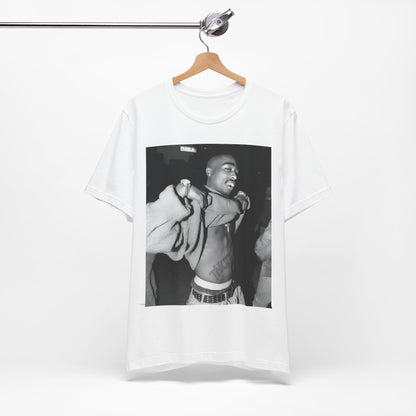 A black graphic t-shirt featuring a vintage hip hop icon graphic of Tupac.