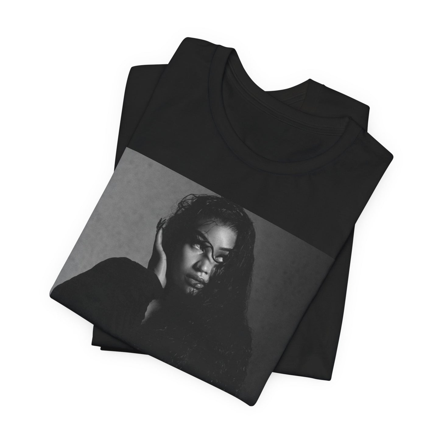 A black graphic t-shirt featuring a black and white graphic or photo of Nicki Minaj as a glamour queen.