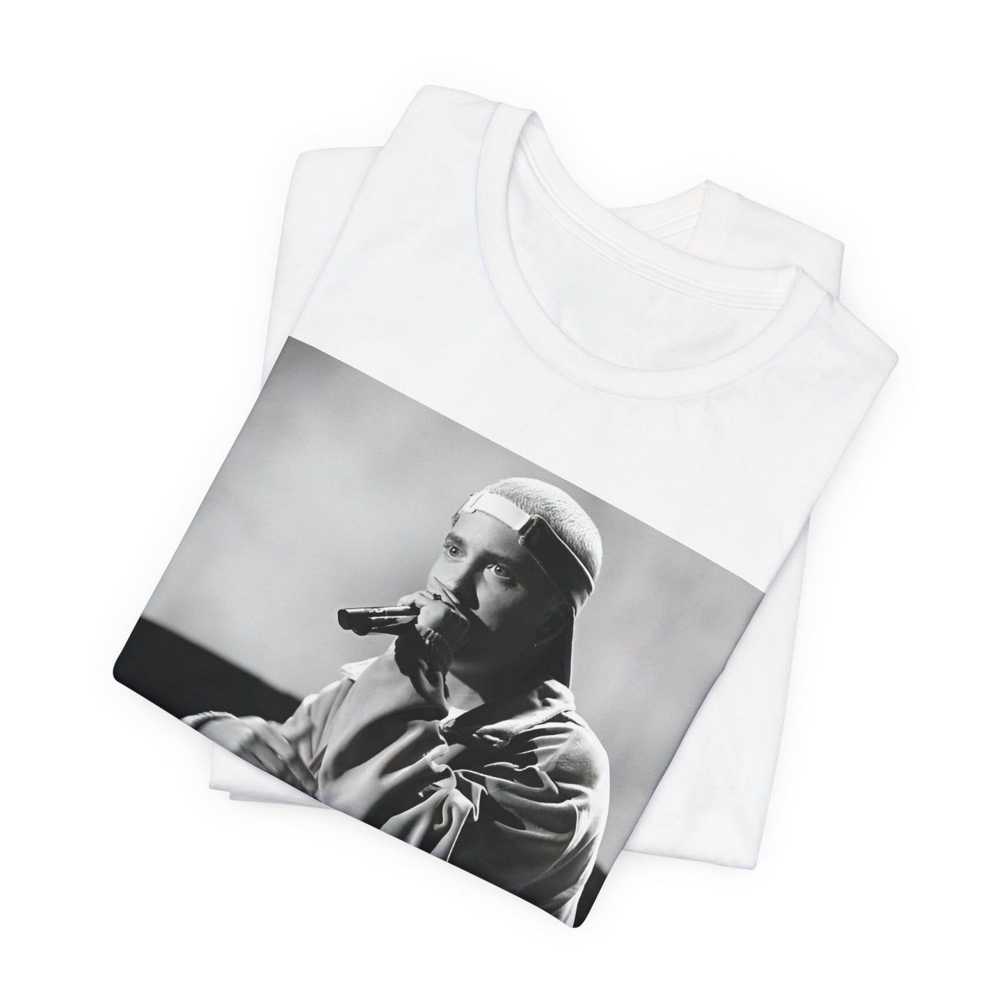 A black graphic t-shirt featuring a black and white graphic of Eminem as a 'Rap Messiah'.
