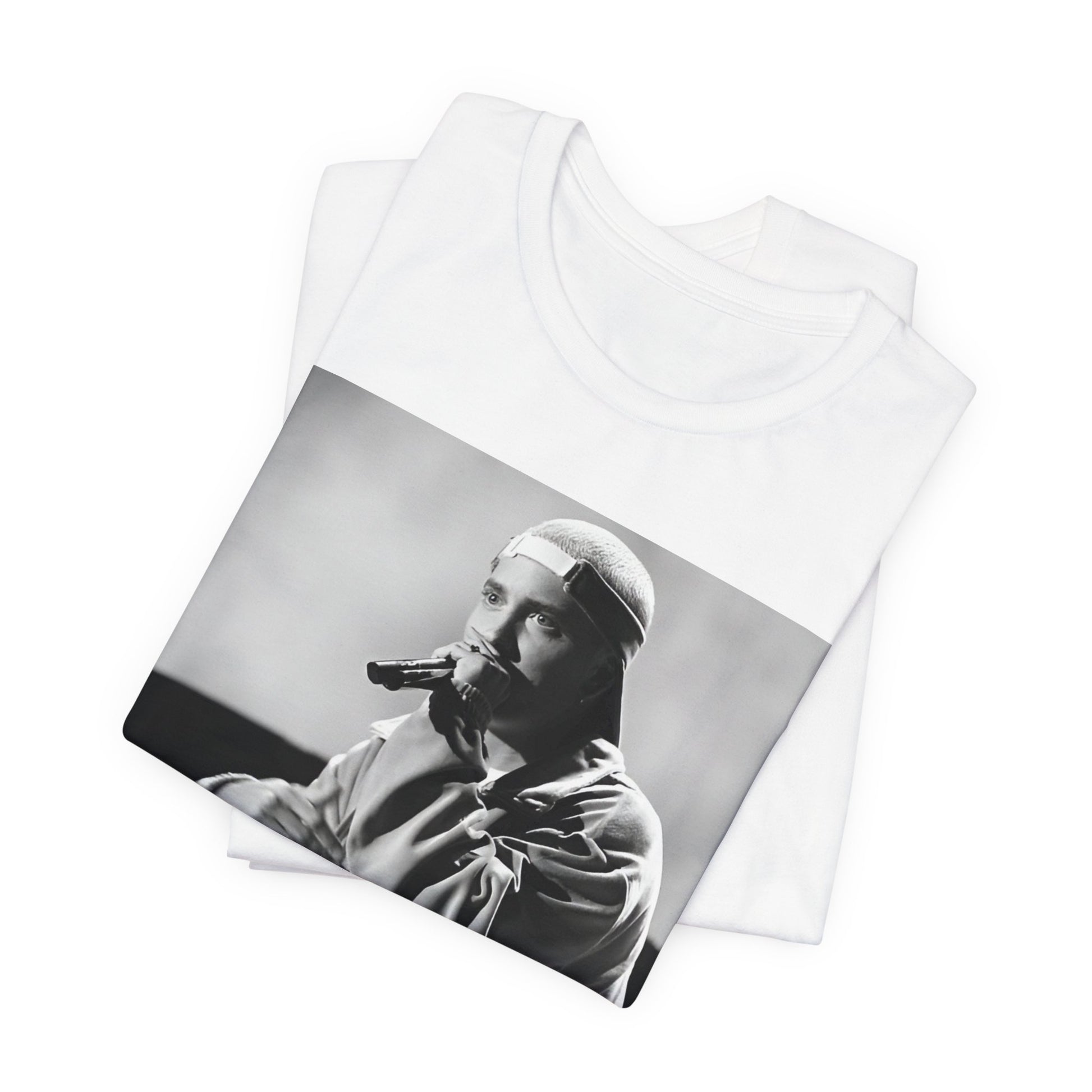 A black graphic t-shirt featuring a black and white graphic of Eminem as a 'Rap Messiah'.