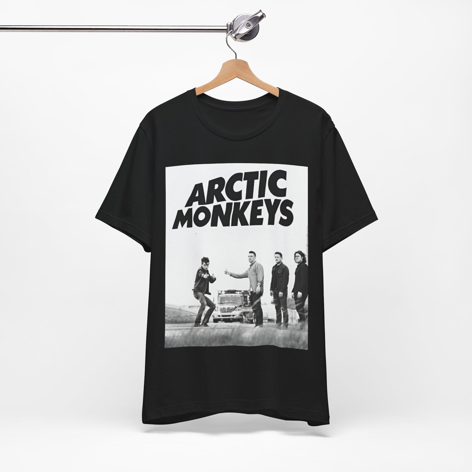 A black graphic t-shirt featuring the Arctic Monkeys logo in black and white.