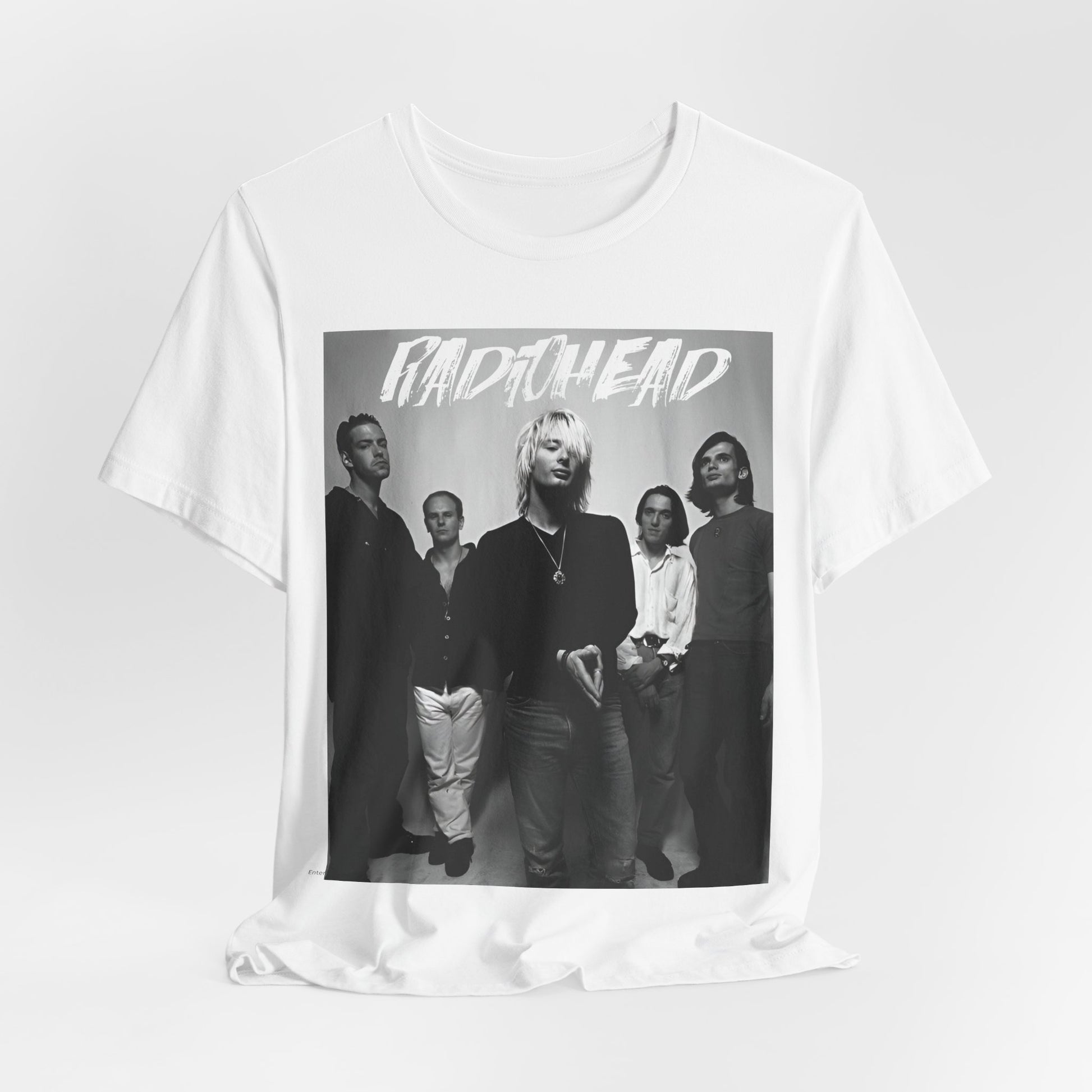 A black graphic t-shirt featuring a retro graphic related to Radiohead's 'OK Computer' album era.