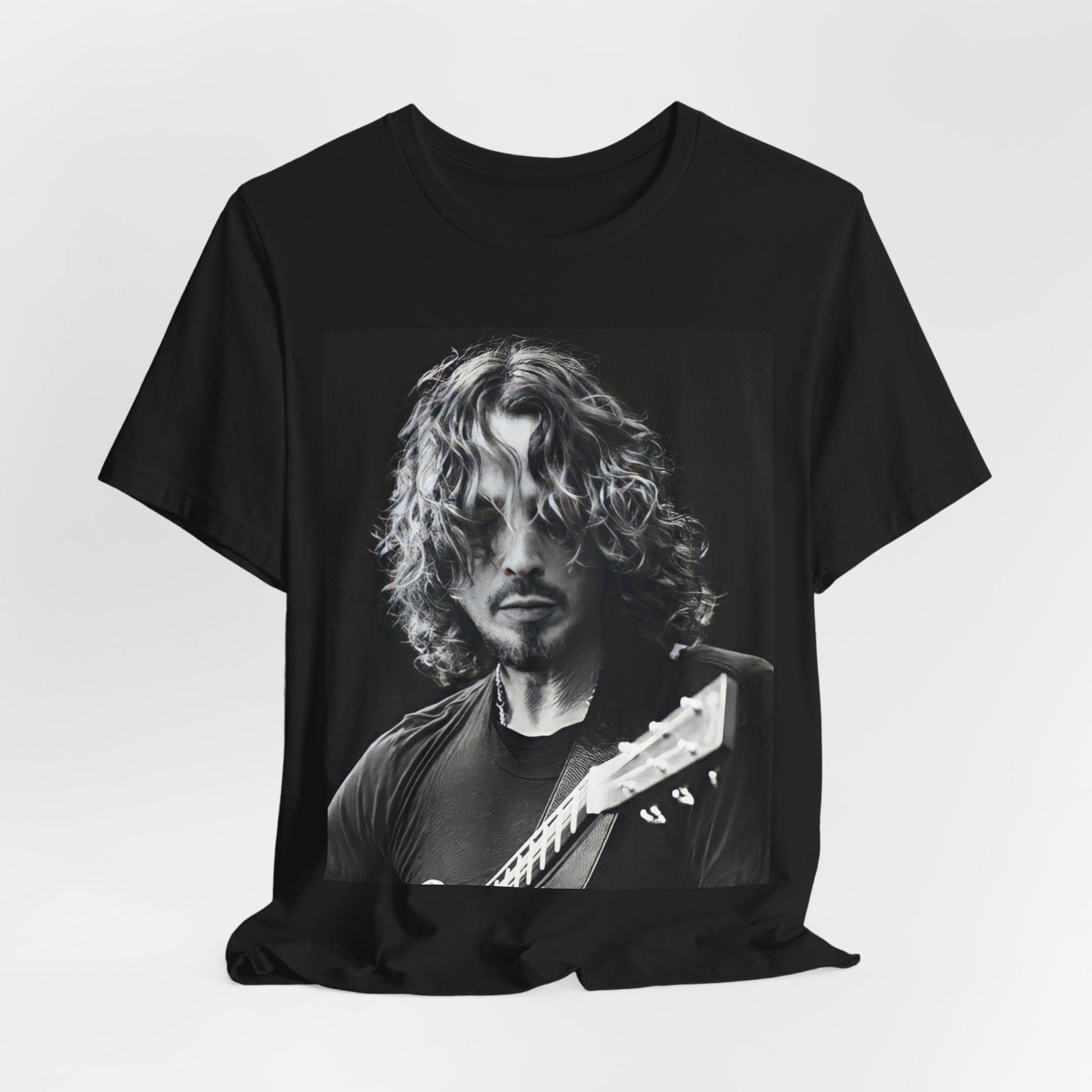 A black graphic t-shirt featuring a graphic of Chris Cornell performing live on tour in the 1990s.