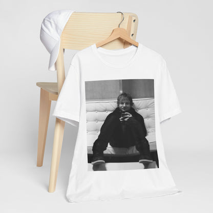 A black graphic t-shirt featuring a bold black and white graphic of Ed Sheeran.