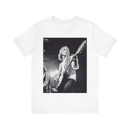A black graphic t-shirt featuring a graphic of Tom Petty as a Rock & Roll Hall of Fame icon.