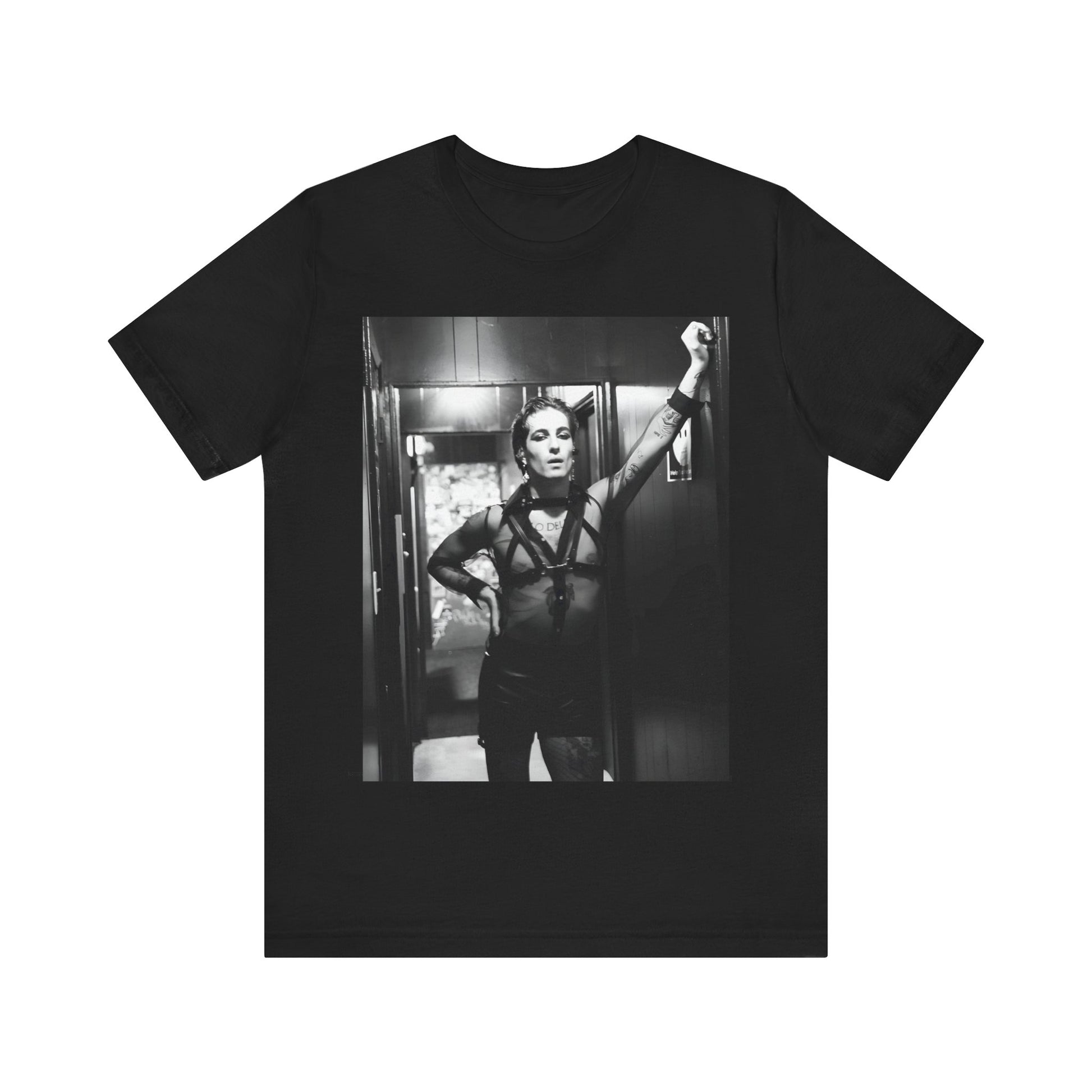 A black graphic t-shirt featuring a graphic of Maneskin emphasizing a rebel rock spirit.