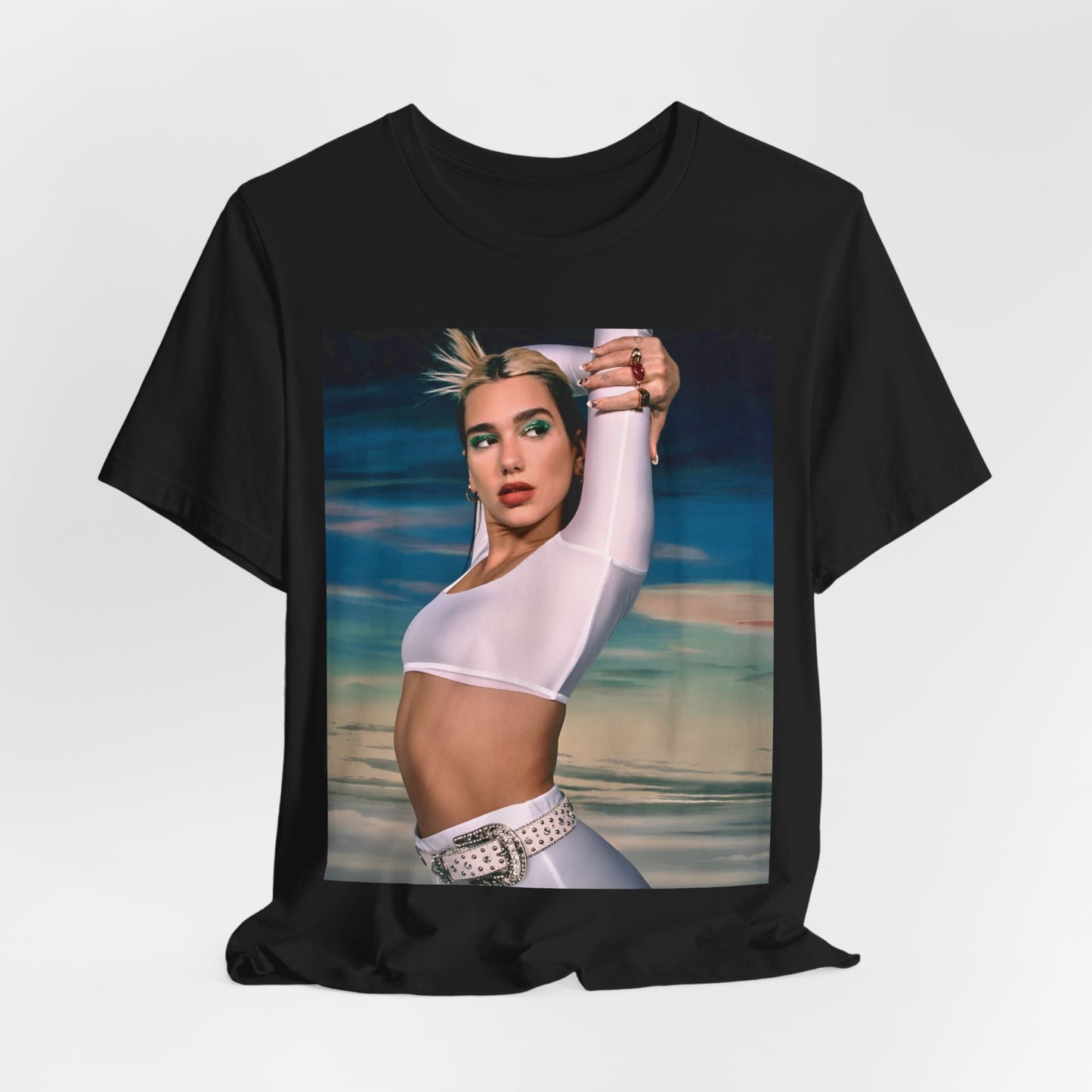 A black graphic t-shirt featuring a stylized graphic of Dua Lipa as a modern pop sensation.