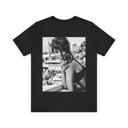 A black graphic t-shirt featuring a black and white photo or graphic of Camila Cabello in an iconic style.