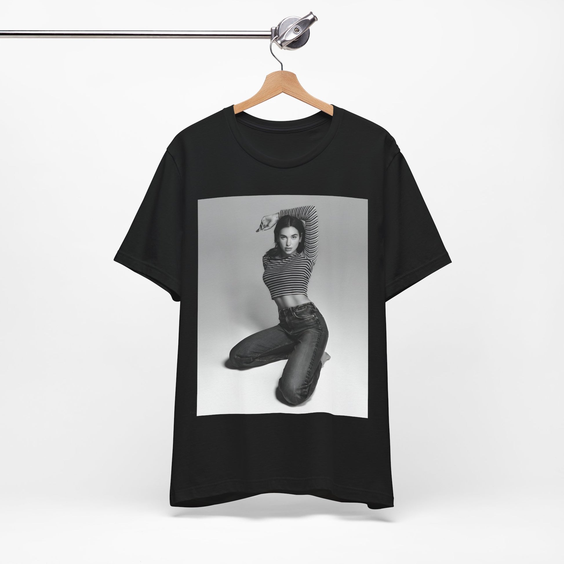 A black graphic t-shirt featuring a black and white photo of Dua Lipa in a posed manner.