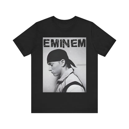 A black graphic t-shirt featuring a stylized graphic of Eminem as a modern rap legend.