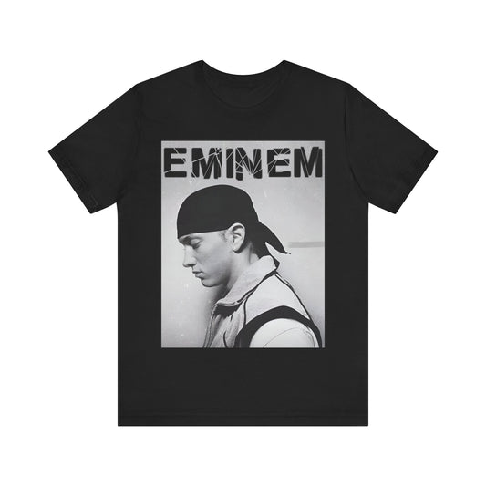 A black graphic t-shirt featuring a stylized graphic of Eminem as a modern rap legend.