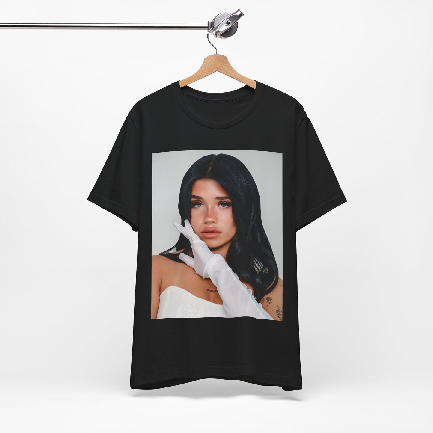 A black graphic t-shirt featuring a portrait graphic of Nessa Barrett.