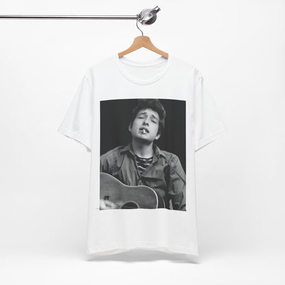 A black graphic t-shirt featuring a photo of Bob Dylan with his acoustic guitar.