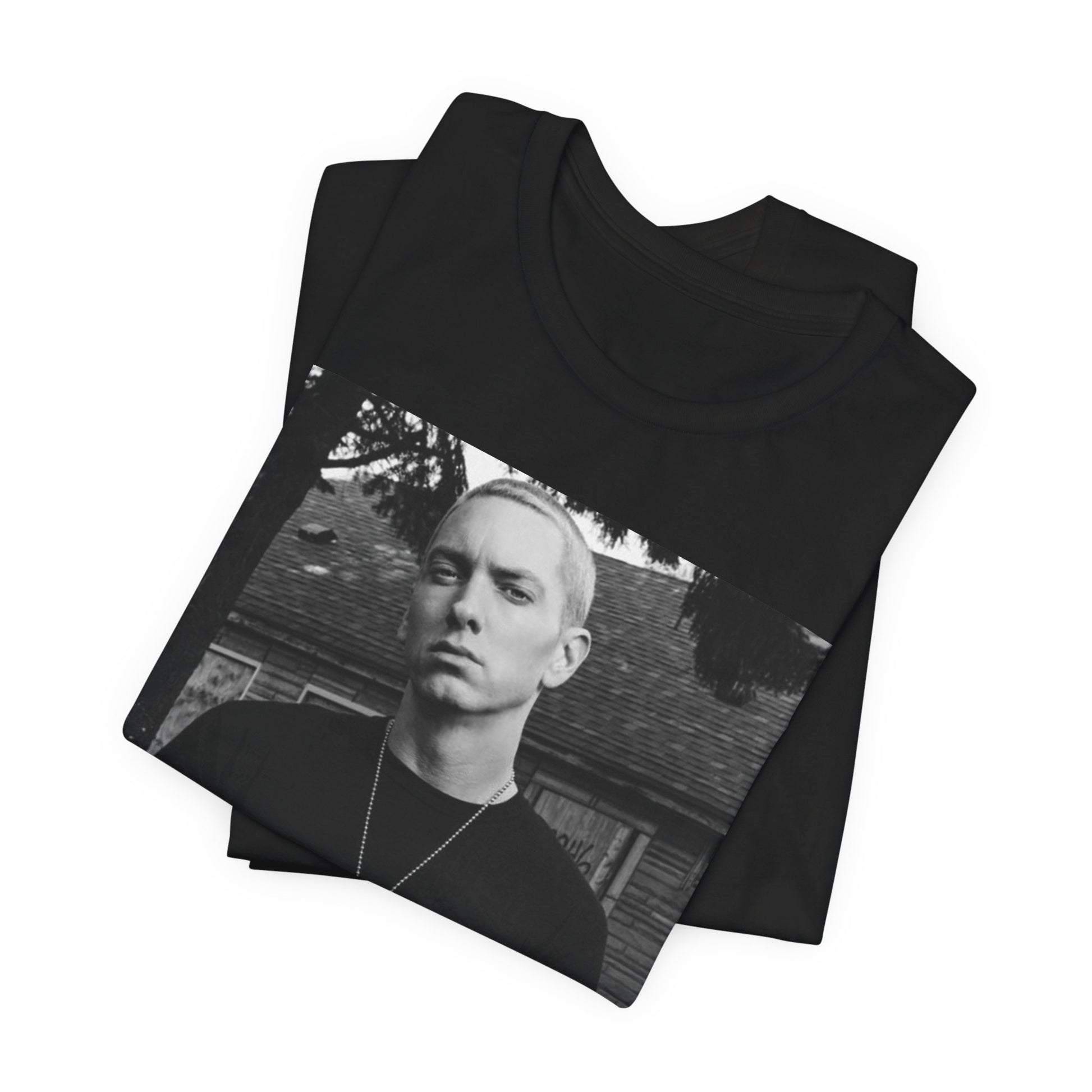 A black graphic t-shirt featuring a black and white graphic of Eminem as Slim Shady.