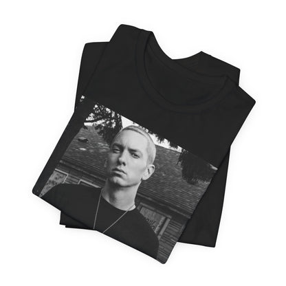 A black graphic t-shirt featuring a black and white graphic of Eminem as Slim Shady.