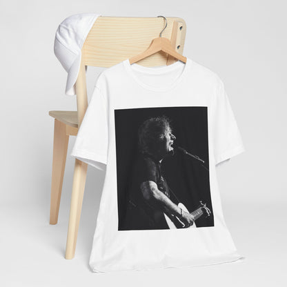 A black graphic t-shirt featuring a graphic related to Ed Sheeran's stadium tour.